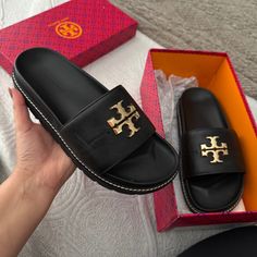 Selling My Brand New Tory Burch Sandals! These Are Hard To Find. I Have So Many Sandals And I Just Have These Sitting In My Closet. Description: Everly Anatomic Lug Paris Nappa Size 9 Color: Perfect Black Tan Leather Footbed Slip-on Sandals, Tan Open Toe Slides With Removable Insole, Elegant Slides With Textured Footbed And Round Toe, Tan Leather Open Toe Slides, Tan Slip-on Sandals With Branded Insole, Tan Sandals With Leather Footbed And Round Toe, Flat Tan Sandals With Leather Footbed, Tan Flat Sandals With Leather Footbed, Tan Sandals With Leather Footbed