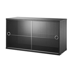 an empty black cabinet with two doors