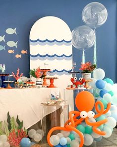 an ocean themed party with balloons and decorations