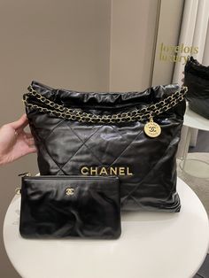 Chanel 22 MediumBlack Calfskin AGHWSize 35 x 33 x 8 cmStrap drop 20 cmMicrochipJuly 20239.8/10 Like New (tried once, minimal storage signs of any otherwise like new)Includes full set box, dust bag and receiptRTP 8710 sgdPrice now 7500 sgd 5600 usd CN5526-01 Chanel Sign, Chanel 22, Minimal Storage, Designer Bags Louis Vuitton, Burberry Sunglasses, Sack Bag, North Korean, Chanel Bag, Full Set