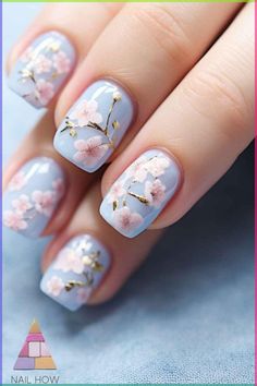 Dive into the elegance of these serene blue cherry blossom nails, adorned with subtle pink blossoms and golden accents. Ideal for a soft spring look or a summer evening event. Visit nailhow.com for more cherry blossom nail art ideas! Blossom Nail Designs, Cherry Blossom Nails Design, Blossom Nail Art, Japan Nail Art, Cherry Blossom Nails Art, Blossom Nails, Japan Nail, Silk Wrap Nails, Dot Nail Designs