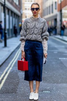 31 Outfit Ideas for All 31 Days in December #purewow #outfit ideas #winter #shopping #shoppable #street style #style #fashion Blue Velvet Skirt, Pull Grosse Maille, Velvet Midi Skirt, Skirt Diy, London Fashion Week Street Style, London Fashion Weeks, Walking Down The Street, Diana Penty, Quoi Porter