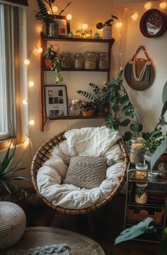 a living room with plants and lights on the wall, hanging from shelves above it