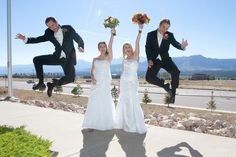 a bride and groom jumping in the air with their wedding party photoshopped on them