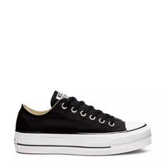 Converse Women's Chuck Taylor All Star Lift Low Top Platform Sneaker Canvas Platform Sneakers With Contrast Sole For Streetwear, Black Canvas Platform Sneakers With Rubber Sole, Canvas Shoes With White Sole And Rubber Heel Cap, White-sole Canvas Shoes With Rubber Heel Cap, Black Cotton Platform Sneakers With Vulcanized Sole, Black Textile Sneakers With Vulcanized Sole, Trendy Cotton Sneakers With White Sole, Black Textile Skate Shoes For Streetwear, Black Cotton Platform Sneakers With Rubber Sole