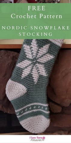 a knitted stocking hanging from a fireplace with text overlay that reads free crochet pattern nordic snowflake stockings