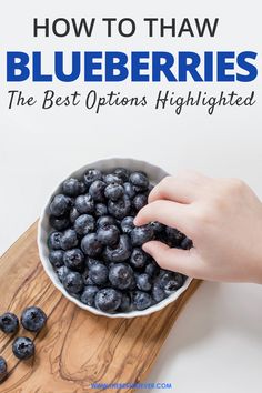 blueberries in a bowl on a cutting board with the title how to thaw blueberries