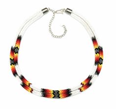 PRICES MAY VARY. Necklace drops approximately 17 inch from shoulder Each rope strand is 16-17 inch long, plus extension Native american inspired designs and colors Handmade using Czech seed beads size 11/0 Beautiful rope style beaded necklace handcrafted with traditional native american southwestern colors and patterns. The necklace features intricate beadwork in vibrant colors and is designed with two strands of beads that form a stylish rope-like pattern. The beads are carefully handwoven usin Southwestern Colors, Double Necklace, Native American Design, Bead Crochet Rope, Black Fire, Native Style, Rope Necklace, Bead Crochet, Necklace For Women