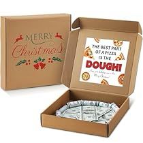 an open christmas card box filled with money