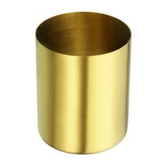 a brass cup on a white background