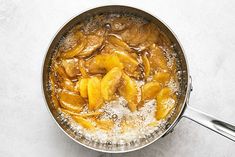 a pan filled with food sitting on top of a counter