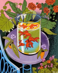 an image of a glass with goldfish in it on a purple plate surrounded by flowers