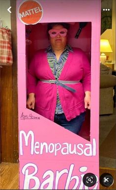 a woman in a pink box with the words menopausal barbie written on it