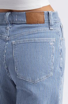 These railroad-striped cropped jeans have slouchy wide legs and a high-fitted waist with the holds-you-in sorcery of Magic Pockets in front. 26 1/2" inseam; 19" leg opening; 11 1/2" front rise; 15 1/2" back rise (size 29) Zip fly with button-tab closure Five-pocket style 99% cotton, 1% elastane Machine wash, tumble dry Imported East Coast Style Fashion, Striped Jeans Outfit, Thrifting Ideas, Cool Mom Style, Sailor Jeans, East Coast Style, 2025 Style, Summer Capsule, Striped Jeans