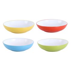 four different colored bowls sitting next to each other