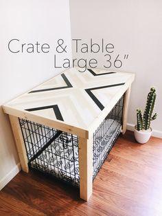 the crate and table are made from wood with black lines on it, along with a cacti plant