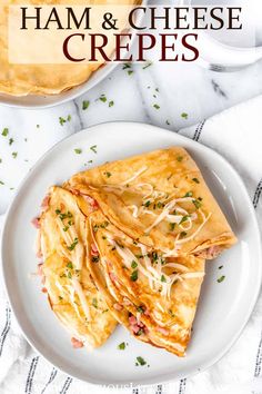 ham and cheese crepes on a white plate