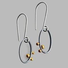 oval oxidized silver small silver hoops with three gold dots Patina Jewelry, Dark Times, Minimal Earrings, Gold Dots, Silver Jewelry Handmade, Dark Background, Small Earrings, Chain Earrings, Minimalist Earrings