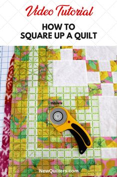 the video guide for how to square up a quilt is shown with scissors on it