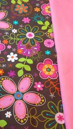 two pink and brown fabrics with flowers on them