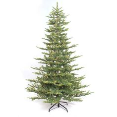 a small christmas tree on a stand with lights in the top and bottom branches, against a white background