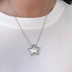 The Star Necklace Silver Women Jewelry features a stainless steel bubble star design, making it a perfect puffy chunky statement jewelry gift for her. The perfect dainty necklace to get a friend, girlfriend, coworker, or daughter! 𝐃𝐄𝐓𝐀𝐈𝐋𝐒:  ⭐️ Star Necklace length 16" + 2" extender  ⭐️ Chunky Star Pendant size is 24mm x 24mm ⭐️ This Puffy Star necklace is 100% stainless steel, water & tarnish proof made to last forever ✨ ⭐️ The best statement chunky necklace to own, The Stargirl necklace Stargirl Necklace, Silver Star Necklace, Star Necklace Silver, Star Jewelry, Star Design, Chunky Necklace, Gift For Friend, Star Pendant, Polish Jewelry