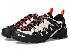 SALEWA Wildfire Edge GTX - Women's Shoes : Oatmeal/Black : With enhanced performance and a customized lacing system, the SALEWA Wildfire Edge GTX Climbing Shoes are perfect for your everyday hikes. Suede leather and microfiber upper. EVA with Ortholite footbed and midsole. Pull tab on the back for easy on and off. Waterproof and breathable membrane. Salewa's trademark 3F System connects the instep area of the boot with the sole and the heel. Round toe design. Pomoca Speed MTN Pro rubber outsole. Black Lace-up Climbing Sneakers, Leather Lace-up Trail Running Sneakers, Leather Lace-up Sneakers For Trail Running, Breathable Leather Lace-up Trail Running Shoes, Leather Trail Running Shoes Sporty Style, Leather Trail Running Shoes With Branded Insole, Leather Hiking Boots With Laces For Trail Running, Functional Leather Lace-up Trail Running Shoes, White Hiking Walking Shoes With Branded Insole