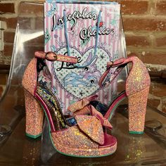 Brand New With Original Box. Irregular Choice Flaming June Pink Glitter Platform Heels Size 6.5 (37 Eu) A Collectors Item. Beautiful Floral Design Inside The Shoe, Pink Glitter On The Outside. Definitely A Statement Piece! Glamorous Multicolor Platform Heels, Glitter Platform Heels, Flaming June, Irregular Choice Shoes, Irregular Choice, Pink Glitter, Platform Heels, Shoes Women Heels, What To Wear