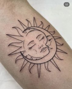 a sun and moon tattoo on the arm