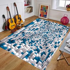 a living room with guitars on the floor and an area rug that looks like it is made out of squares