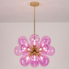 a pink chandelier hanging from the ceiling