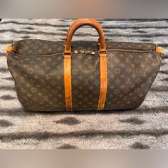 Purchased From Fashionphile. Bag Has Wear. Please Look At Pictures For Callouts. Bag Is Still In Very Good Condition And Is Useable. Also Comes With Fashionphile Dust Bag It Came With. Bags Louis Vuitton, Louis Vuitton Bags, Travel Bags, Louis Vuitton Bag, Louis Vuitton Monogram, Dust Bag, Look At, Bag Lady, Louis Vuitton