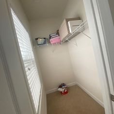 the closet is empty and ready to be used for storing items or other things in