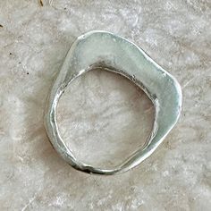 Introducing the Cassia stacking rings! These unique, sculptural rings are perfect for adding a touch of minimalism to any outfit. They're also super easy to wear and stack, thanks to their light weight and slender design. Plus, they make great little pieces of art to take with you wherever you go. So if you're looking for something different and stylish, these Cassia beauties are definitely for you! Style tip: Stack up these rings in a set of 2 or 3 with alternating metals and pair them up with Sculptural Rings, Minimal Silver Ring, Make Rings, Sculptural Ring, Ring Inspo, Silver Ring Designs, Recycled Metal, Something Different, Raw Brass