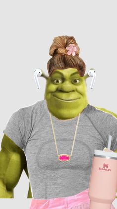 the shrap is holding a drink and wearing headphones on her ears,