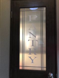 a glass door with the words pantry on it