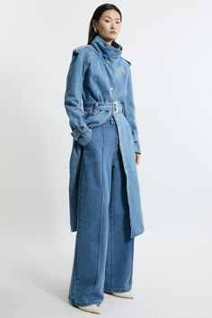 Bring In The Summer With A Pair Of Our Wide Leg Trousers, Made In Denim Fabric, With A Dramatic, Wide Fit, Cinched At The Waist With A Belt. The Minimal Design Makes Them Easy To Style, So Wear Them With A Cropped T-Shirt And Trainers On A Casual Day, Then A Button Up Shirt And Loafers For A More Elevated Approach. Denim Belted Waistband Wide Leg Trousers High Quality Denim Fabric Comfortable High Waistline Belted Waistband Pocket Features Flattering Wide Leg Fit Wide Leg Jeans T Shirt Outfit, Unique Denim Outfit, Unique Designs Fashion, Womens Denim Outfits, Couple Denim Outfits, High Rise Belted Jeans For Spring, Spring High Rise Belted Jeans, Belted Blue Denim Jeans, Spring Belted Jeans