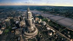 an aerial view of a city with tall buildings