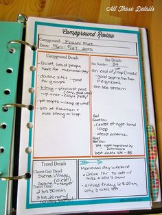 a recipe book is open on top of a wooden table, with writing in it