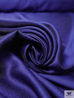 the fabric is very bright purple and it looks like something out of an old movie