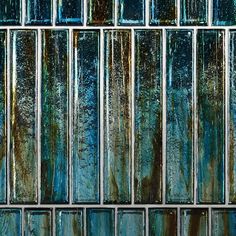 an image of a glass block wall that looks like it has been painted blue and green