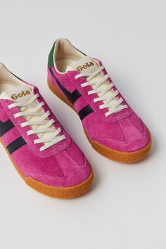 Classic Elan sneakers by Gola in a low top silhouette. Features a lace closure to the front and finished with a durable rubber sole. Features Classic court sneakers from Gola Lace-up style Content + Care Leather, suede, rubber Spot clean Imported Size + Fit Please note, these Gola shoes are sold in US women's shoe sizes | Gola Elan Sneaker in Fuchsia/Black/Evergreen, Women's at Urban Outfitters Cool Sneaker Outfits, Sneaker Looks For Women, Women’s Everyday Shoes, Gola Elan Sneakers, Colored Sneakers Outfit, Women’s Fashion Sneaker, Cool Girl Shoes, Gola Sneakers Outfit, Cool Sneakers Women