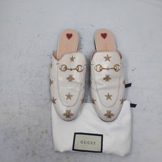 Gucci Princetown Embroidered Bees Stars White Toe Horsebit Mule Size Us 10.5 Eu 40.5 Womens Comes With Dustbag 100% Authentic White Leather Upper Mule With Gold Thread Embroidered Bees And Stars Leather Lining Horsebit Detail Elongated Toe Leather Sole Please Note Signs Of Wear On The Bottom As Shown. Faint Lines On Upper As Shown. Please Note I Tried To Capture Any Faint Mark On Exterior - It Blends In With The Pattern. 4.27 Gucci Princetown, Shoes Gucci, Gold Thread, Gold Threads, Gucci Shoes, Mule Clogs, Mules Shoes, Mule, White Leather