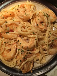 pasta with shrimp and sauce in a skillet