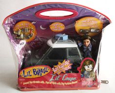 a toy police car with its lights on in a plastic bag that says lil blyz