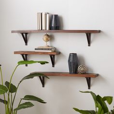 Enhance your space by organizing decor on this geometric set of 3 floating shelves, adding character to any industrial-themed living room or kitchen. This item ships in 1 carton. Can be hung horizontally using the keyholes; nails and screws not included. Suitable for indoor use only. This item ships fully assembled in one piece. Maximum weight limit is 20 lbs. This brown colored wood floating shelf comes as a set of 3. Wood wall shelf features 3 shelves. Industrial style. Grayson Lane 48-in L x Japanese Wall Shelves, Dark Wooden Shelves, Dark Wood Wall Shelves, Dark Wood Shelving, Dark Brown Shelves, Dark Wood Shelf Decor, Dark Wood Shelf, Redoing Room, Dads Office