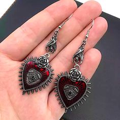 Brand New Boutique Item. Pair Of Red & Silver Metal Gothic Style Dangle Earrings That Feature Read Hearts With Spikes & A Silver Rose On Top, An Evil Eye In The Middle, & A Little Bat Hanging Upside Down From The Top Of Each Earring. See Pictures For Details. Tags: Goth Symbols Vampire Bat Jewelry Goth Earrings, Heart Vintage, Vintage Goth, Rose Heart, Vampire Bat, Gothic Earrings, Rosé Heart, Retro Earring, Style Punk