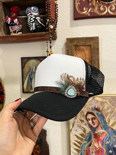 Hand branded leather strap with turquoise metal accent with feathers. Hat Patch Ideas, Leather Hat Patch, Hat Chain, Nfr Outfits, Cowboy Hat Design, Custom Baseball Hats, Custom Cowboy Hats, Patch Ideas, Hat Patch