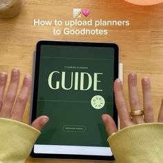 a person is holding an ipad with the text guide on it and their hands are next to them