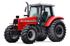 a red tractor with big tires is shown